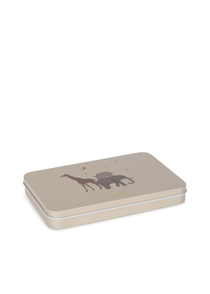 The Konges Sloejd Beeswax Crayons - Safari come in a rectangular beige metal tin with a lid, featuring simple giraffe and elephant illustrations under stars and a crescent moon—ideal for storing natural crayons.