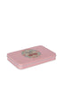 The Konges Sloejd Beeswax Crayons - Cherry Bow come in a rectangular pink tin box with rounded edges, adorned with a cherry and floral wreath design on the lid. The closed box is shown against a plain white background.