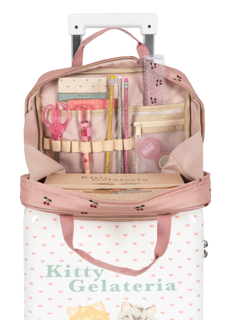 Open the Konges Sloejd Holiday Essentials Bag - Cherry, standing upright and filled with organized kids’ stationery—scissors, pencils, rulers, pens. Features cherry and cat design with "Kitty Gelateria" on the front. Perfect for travel activities!.