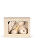 The Konges Sloejd Petit Music Set - Glossy Cherry is a boxed kids' musical instrument set with a cherry design, featuring wooden maraca, bell, and shaker visible through a clear window on the "Magical music" packaging.