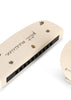 The Konges Sloejd Petit Music Set - Glossy Lemon includes a cream-colored harmonica with small yellow lemon illustrations and "Petit Musicien" text, shown here on a white background.