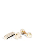 The Konges Sloejd Petit Music Set - Glossy Lemon features three cream wooden instruments with gold bird designs—a harmonica, clappers, and double-headed maracas for kids—arranged on a white surface.