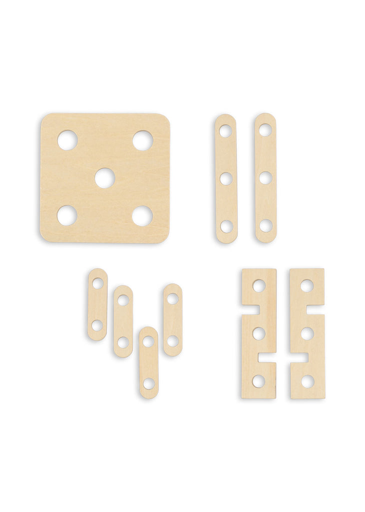 Five light wooden pieces with rounded edges, each featuring multiple circular holes—a perfect addition to the Konges Sloejd Tool Bench—including one square piece, two long strips, three short strips, and four interlocking pieces displayed on a white background.