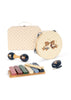 The Konges Sloejd Music Set - Teddy Bear is a delightful wooden instrument collection for kids, featuring a tambourine adorned with cute bear illustrations, a maraca, a xylophone, castanet, drumsticks, and a cream-colored polka dot carrying case.