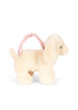 The Konges Sloejd Puppy Bag - Off White is a plush dog with floppy ears and a pink floral handle, serving as both a cuddly toy and a stylish bag for kids.