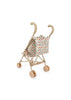 Konges Sloejd Doll Stroller - Colored Hearts features a beige frame, curved handles, four double wheels, and a removable cream seat with a colorful heart pattern. Shown empty against a white background.