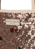 Rose gold sequined fabric featuring cherry-shaped sequins and a “Konges Sløjd cherry on top” label, shown here on a Konges Sloejd Mini Doll Pram - Sparkly Cherry Sequin.