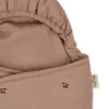 A close-up of the Konges Sloejd Doll Sleeping Bag in Cherry Blush, crafted from soft organic cotton for cozy doll naps.