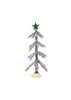 Konges Sloejd Christmas Door: a silver tinsel tree with colorful ball ornaments and a glittery green star topper on a round base.