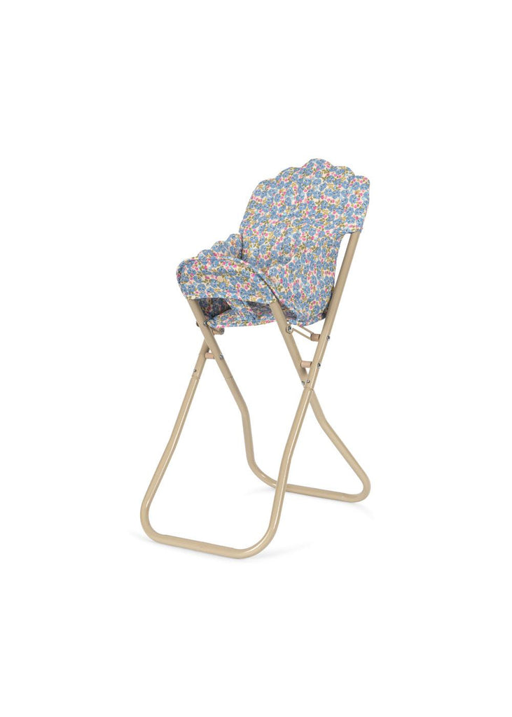 The Konges Sloejd High Chair - Rose Flower is a beige, foldable doll high chair with a detachable seat and backrest featuring colorful, floral-patterned fabric, shown against a white background.