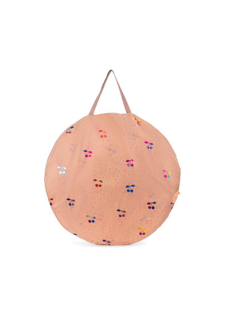 Round, peach-colored bag with handle, featuring colorful cherry motifs and tiny dots—ideal for carrying your Konges Sloejd Lace Pop-Up Beach Tent UPF 50+. Shown against a white background.