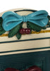Konges Sloejd Christmas Door featuring a decorative archway topped with a blue bow, green pine needles, and red cherries, finished with a gold glitter trim.