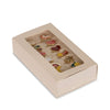 A beige cardboard box with a clear window holds the Konges Sloejd 12 Pack Ring Set, featuring colorful rings in playful shapes like stars, hearts, flowers, and moons—perfect for little ones to admire, wear, and collect.