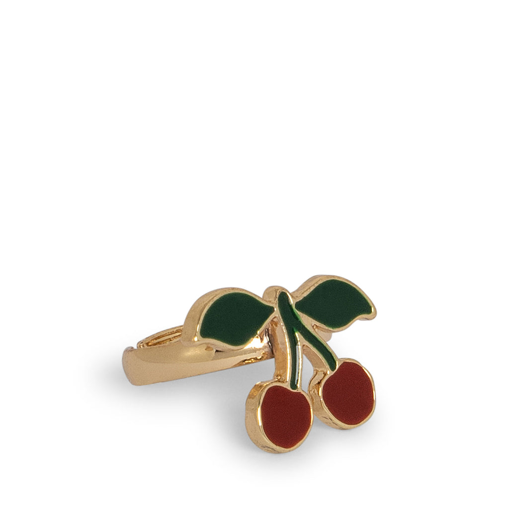 The Konges Sloejd 12 Pack Ring Set features gold rings with playful motifs like red cherries with green leaves on a white base, each designed with an adjustable band for a perfect fit on little fingers.