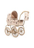 The Konges Sloejd Mini Tulle Doll Pram - Cherry Sequin is a vintage-style beige pram for children, featuring large wheels, a canopy, matching bag, and cheerful cherry sequin print fabric.