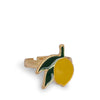 The Konges Sloejd 12 Pack Ring Set includes an adjustable gold ring decorated with a yellow lemon and two green leaves, perfect for small fingers and displayed on a white background.