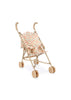 The Konges Sloejd Doll Stroller - Lumina features a beige frame with curved handles, four sets of double wheels, and a floral-patterned seat in orange, green, and pink.