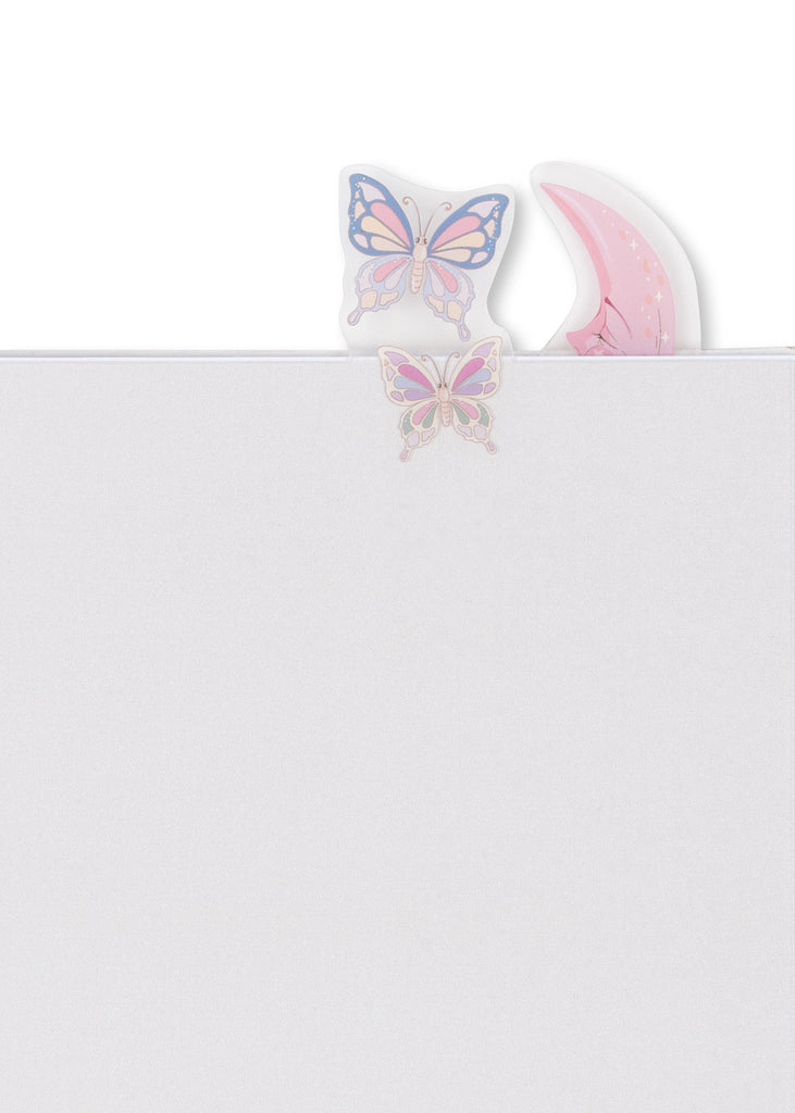 A white A5 notebook page from the Konges Sloejd My Stationery Box - Unicorn, marked with butterfly and crescent moon tab stickers.