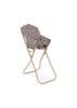 The Konges Sloejd High Chair - Kyoto is a foldable doll high chair with a beige metal frame and a seat/backrest in pink and green floral fabric, perfect for charming doll furniture collections.