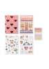 The Konges Sloejd Creative Art Caddy - Glitter Rose includes a pink heart notebook, a shopfront card, two sheets of animal and floral stickers, and one sheet of colorful icon stickers—all beautifully arranged on a white background—making it the perfect kids art kit to spark creativity.