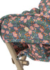 Close-up of the Konges Sloejd High Chair - Kyoto, a foldable doll high chair with a beige metal frame and fabric seat decorated in a colorful Kyoto floral pattern—an adorable addition to any doll furniture collection.