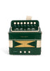 A dark green Konges Sloejd Accordian for kids featuring white buttons, labeled keys, and a gold-accented bellows.