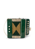 Konges Sloejd Accordian in dark green with yellow bellows, cream-colored buttons, and labels for the air valve and musical notes.