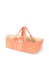 The Konges Sloejd Doll Lift - Rose Dot is a charming, peach-colored cotton doll carrier featuring white polka dots, scalloped edges, and a soft quilted interior. Designed with two handles for easy carrying and a cozy padded construction perfect for little hands, this OEKO-TEX certified Moses basket offers both safety and style for your child’s playtime.