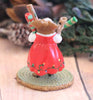 The Wee Forest Folk Tiny Collectible - Wrap it Up! (Not a Toy) features a hand sculpted mouse in a red dress with garland, standing on a mat and holding three gifts among pinecones and greenery—a charming miniature scene.