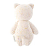 A Cuddle + Kind Baby Kitten in a pastel color with multi-colored speckles, viewed from the back against a white background. The toy features distinct ears and a tail, and a small