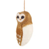 A Handmade Felt Owl Ornament, made in Nepal, featuring brown and white colors, hanging from a string with detailed stitching and a heart-shaped face.