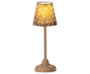 A decorative Maileg Vintage Mouse Lamp - Small with a metallic stand and floral-patterned lampshade illuminated from within, casting a warm, inviting glow.