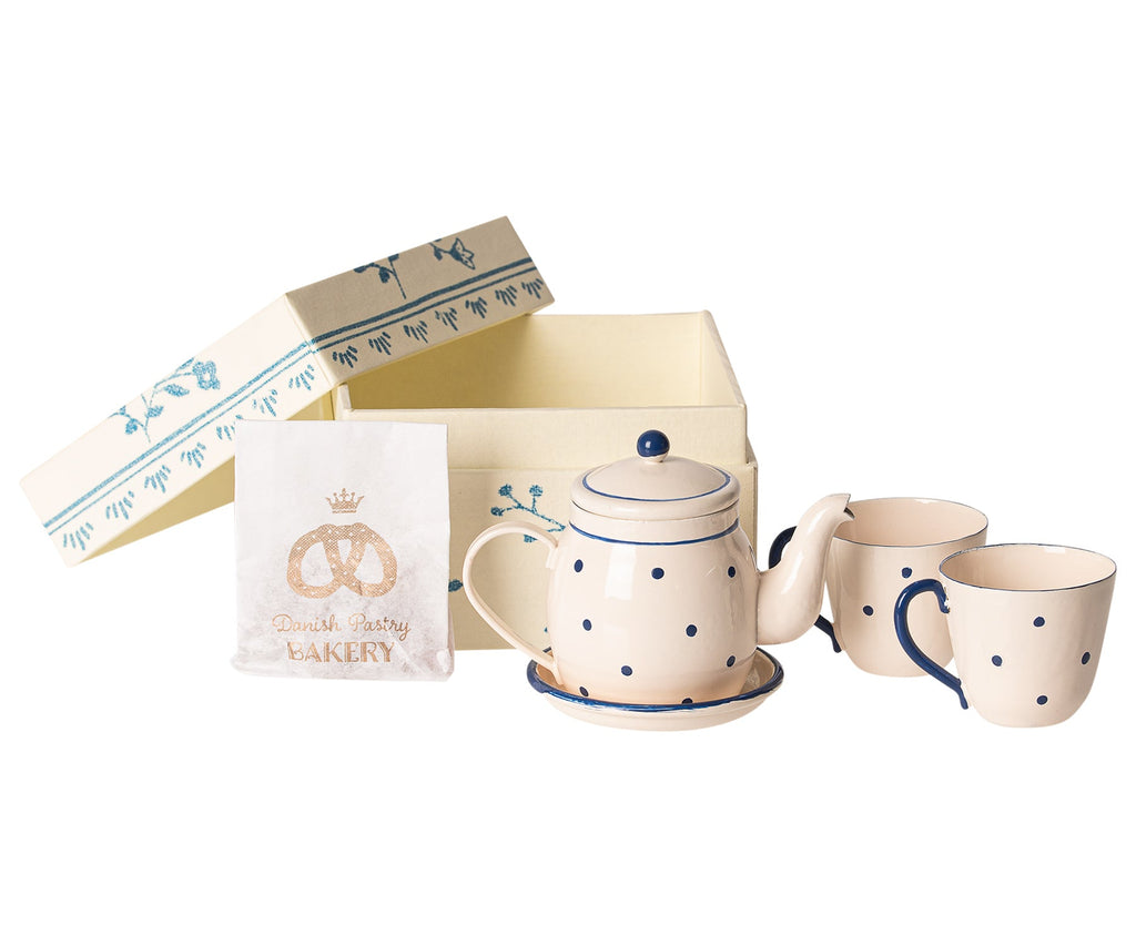 A Maileg Miniature Tea & Biscuits for Two set including a polka-dotted teapot, two cups, and an open keepsake box with a "danish pastry bakery" napkin, all against a white background.
