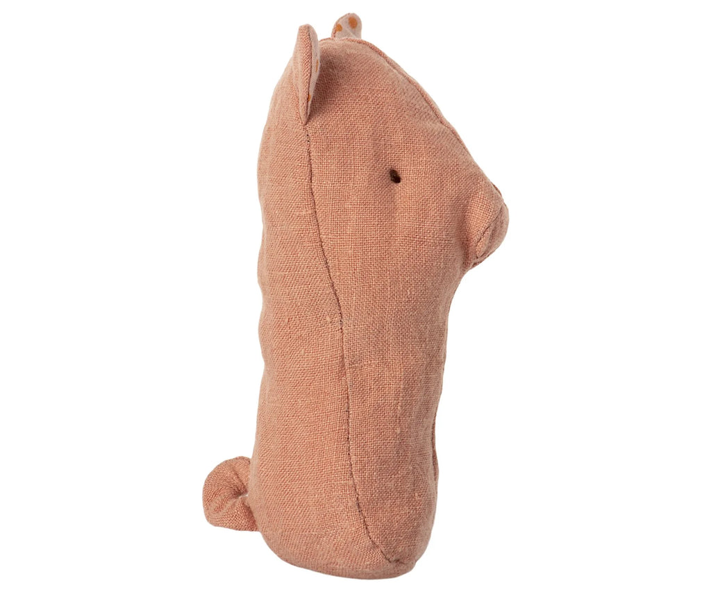 Side view of a small, plush toy shaped like a bear, made from soft fabrics in a brown, textured finish. The toy has simple stitching, minimal detailing, and an overall soft, minimalist design—perfect for adding to Maileg Lullaby Friend Rattles, Pig or nestling in a gift box.