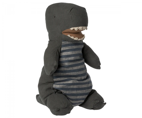 A plush toy dinosaur resembling a Maileg Large Dark Green Gantosaurus Dinosaur, specifically a T-Rex, with a dark gray body and lighter gray horizontal stripes on its belly. It features a large mouth with visible white teeth and small stubby arms and legs, crafted from soft mix fabric for extra cuddliness.