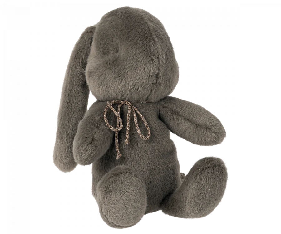 Grey plush bunny with bow around its neck. 