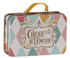 The Maileg Suitcase, Small—a metal suitcase with a yellow handle, decorated in a pastel harlequin pattern and adorned with the phrase “Cirque de l’Amour” on the front—offers a charming storage solution for small items or an enchanting way to present small gifts.