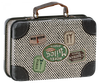 A charming vintage-style Maileg Suitcase, Small, crafted from patterned metal with leather corners and a brown handle, featuring travel stickers labeled “Paris,” “Baggage Room,” and “Hotel Majestic Paris” on the front—perfect for storing small soft toys or as delightful gift packaging.