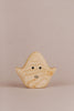 A small wooden toy shaped like a simplified ghost, finished with natural linseed oil to enhance the light wood grain. The Wooden Ghost Emotions, one of our charming wooden ghost figures, has black dot eyes and an open oval mouth expressing basic emotions, with its "arms" slightly raised against a soft beige background.