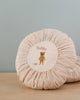 A round Maileg Cushion, Small with a beige and white striped border. The center features an embroidered design of a small teddy bear with the word "teddy" above it, set against a white background.