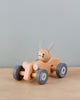 wooden car with bunny driver