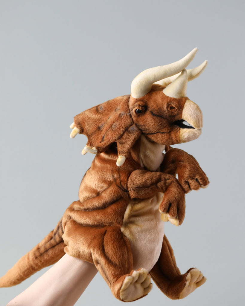 A Triceratops Puppet, high-quality and realistic, held up against a plain, light background, showcasing its detailed features and textures.