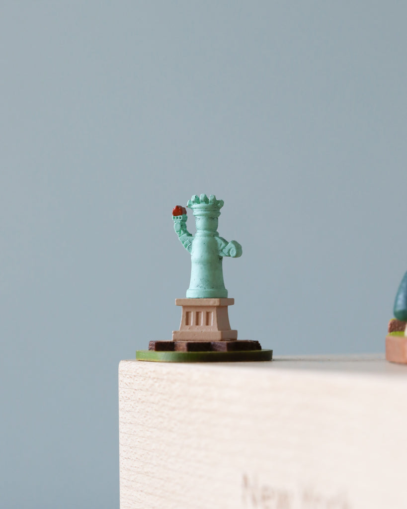 Close up of the Statue of Liberty on the music box. 