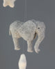 A close-up image of a hanging felt elephant figure, crafted in gray with visible stitching and a soft texture, suspended against a light gray background as part of the Handmade Mobile - In The Jungle - Final Sale.