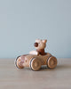 Wooden car toy with a cat as the driver. 
