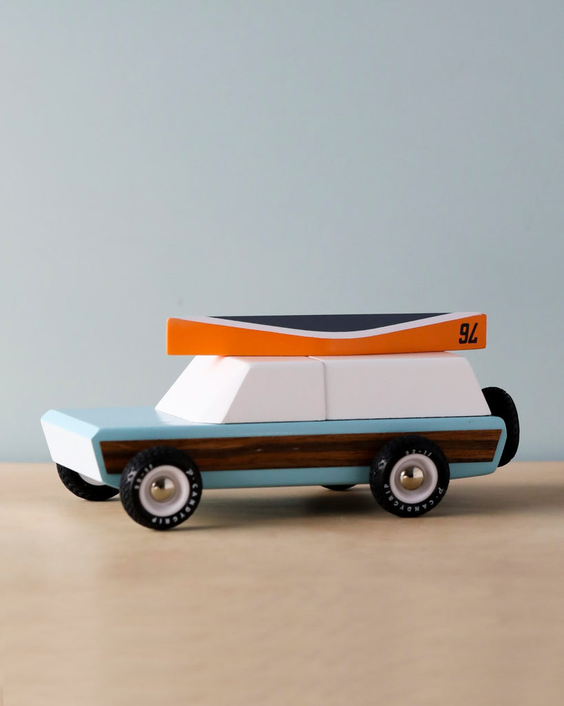 wooden car toy with canoe