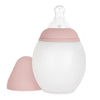 A Medical Grade Silicone Baby Bottle with a pink cap and measurement markings in both milliliters and ounces, isolated on a white background.