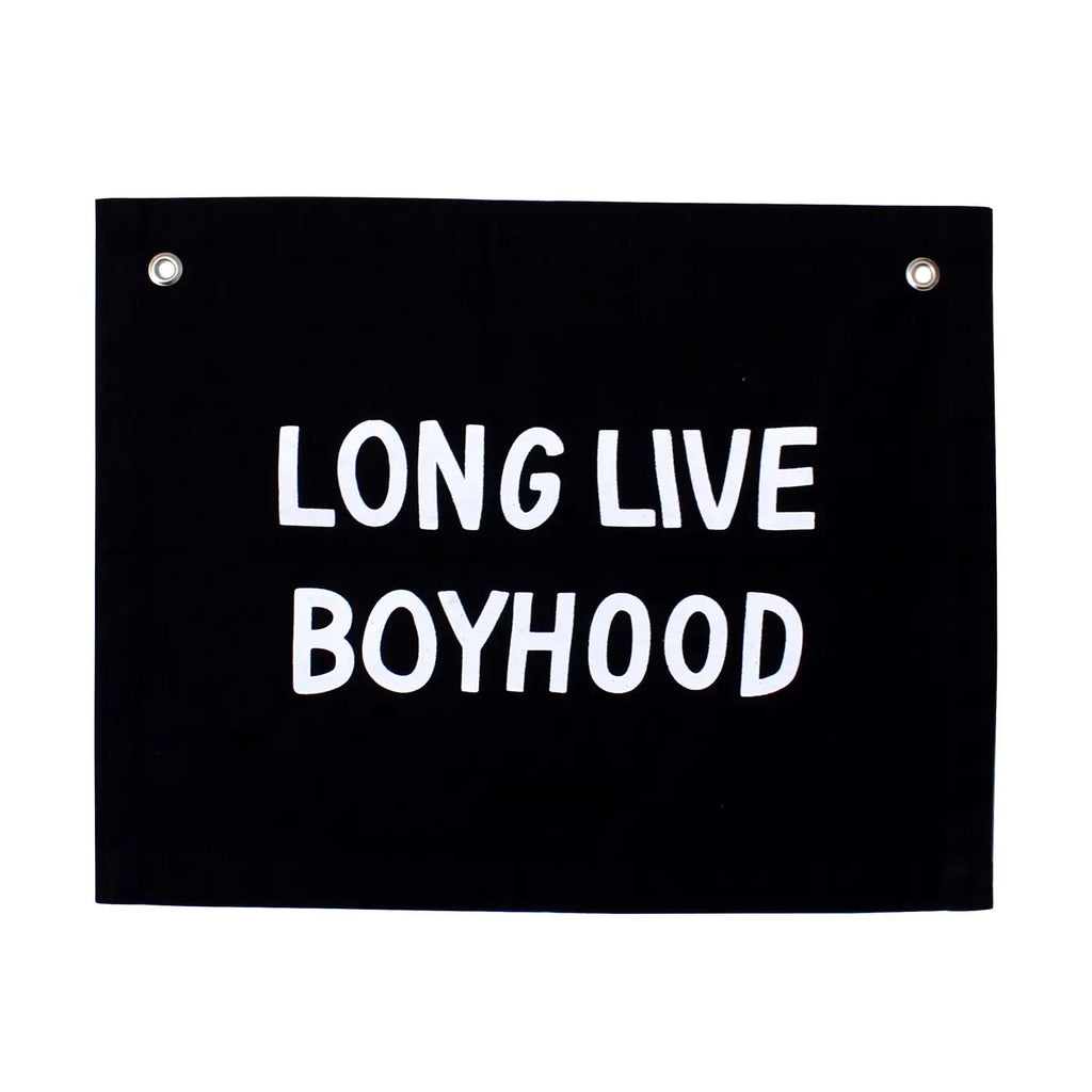 Black long live boyhood banner photographed against white background. 