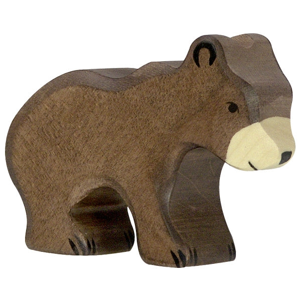 The Holztiger Small Brown Bear is a wooden bear figurine featuring a simple, handcrafted design typical of HOLZTIGER figures. This European-made figurine is brown with a lighter beige snout and black detailing for the eyes and nose, adding to its charming, rustic appeal.