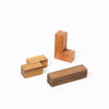 Three Wooden Puzzle of different shapes and sizes on a white background, posing a choking hazard.